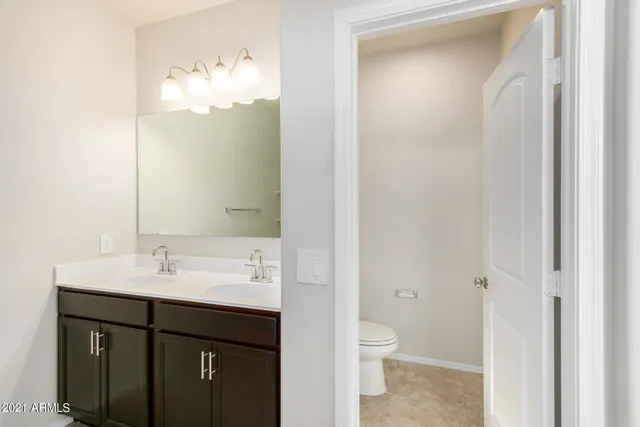 an empty room with a bathroom