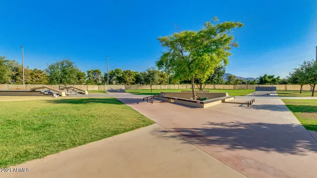 a view of a lake with a house in the background