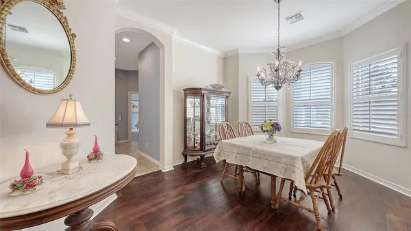 a view of a dining room with furniture