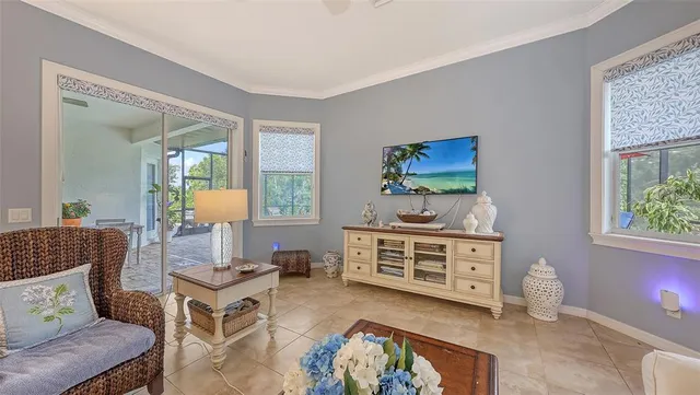 a bedroom with bed and cabinets