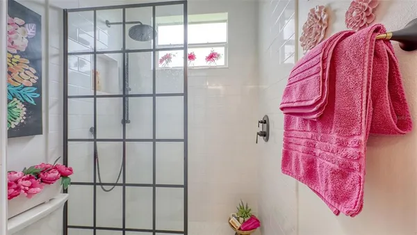 a view of a chairs and table in a patio