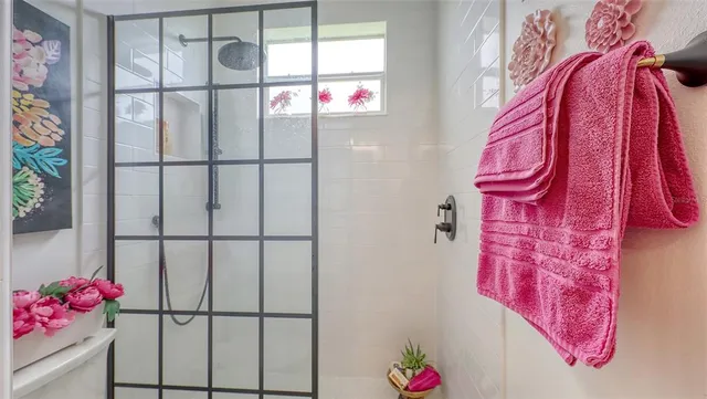 a view of a chairs and table in a patio