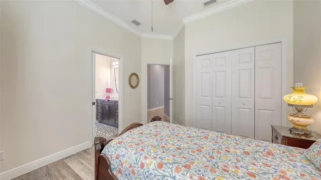 a backyard of a house with lots of green space and fountain