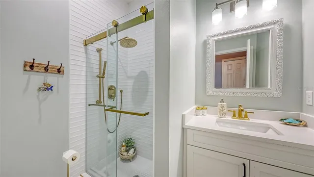 a backyard of a house with a yard and outdoor seating