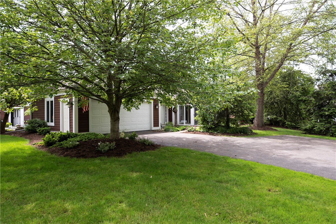 36 Willowbrook Drive Owasco, NY 13021 - Photo 7 of 47 Garage/side yard
