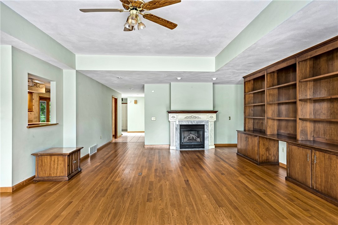 36 Willowbrook Drive Owasco, NY 13021 - Photo 10 of 47 Living room with gas fireplace