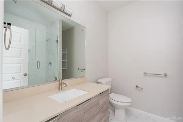 a bathroom with a sink and a toilet