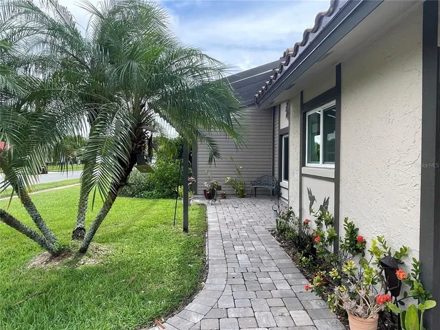 a backyard of a house with lots of green space