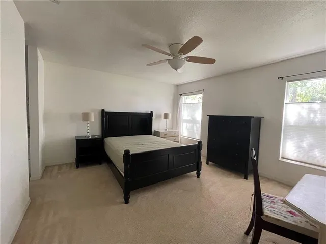 a kitchen with a sink stove and refrigerator