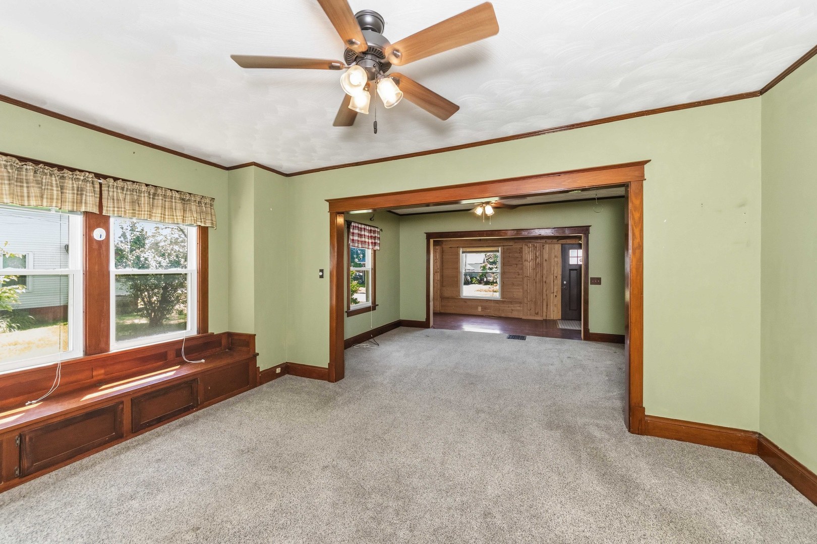 412 West 5th Street Minonk, IL 61760 - Photo 2 of 23 a view of an empty room with a window