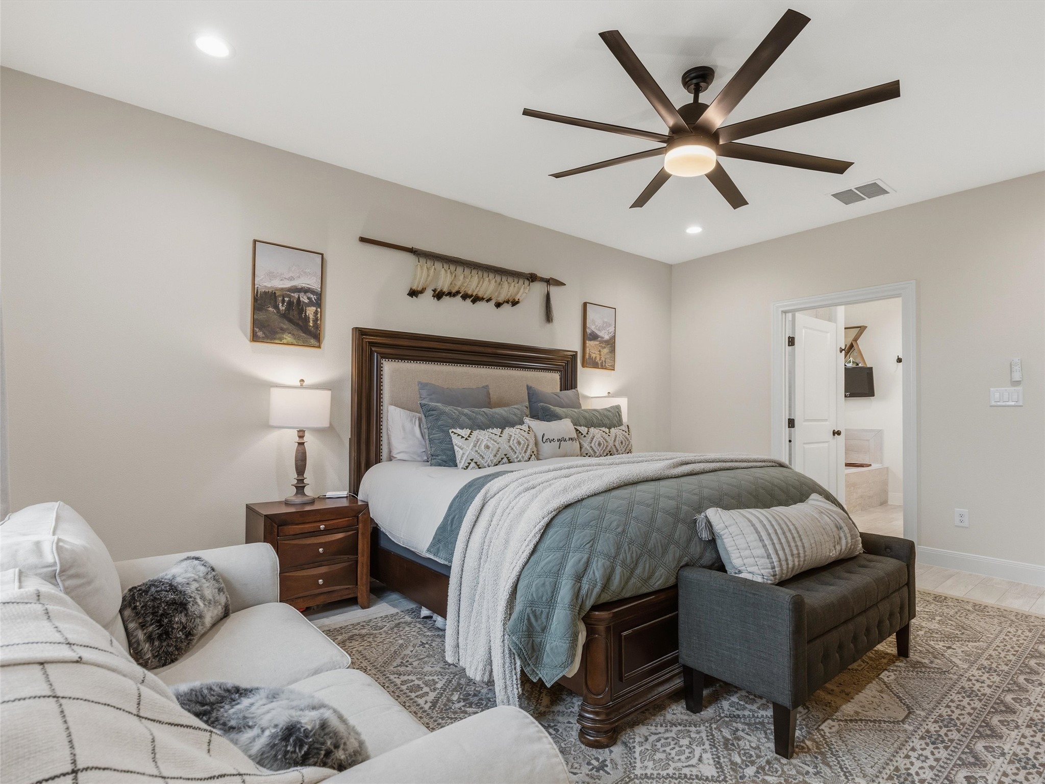 334 Webb Street Smithville, TX 78957 - Photo 14 of 36 a bedroom with a bed couch and window