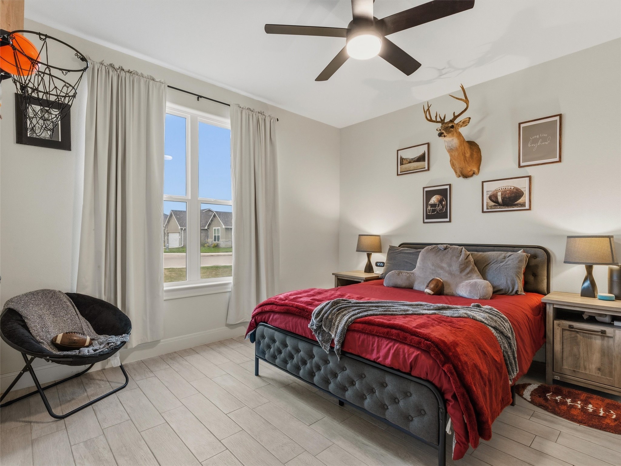 334 Webb Street Smithville, TX 78957 - Photo 20 of 36 a spacious bedroom with a bed and window