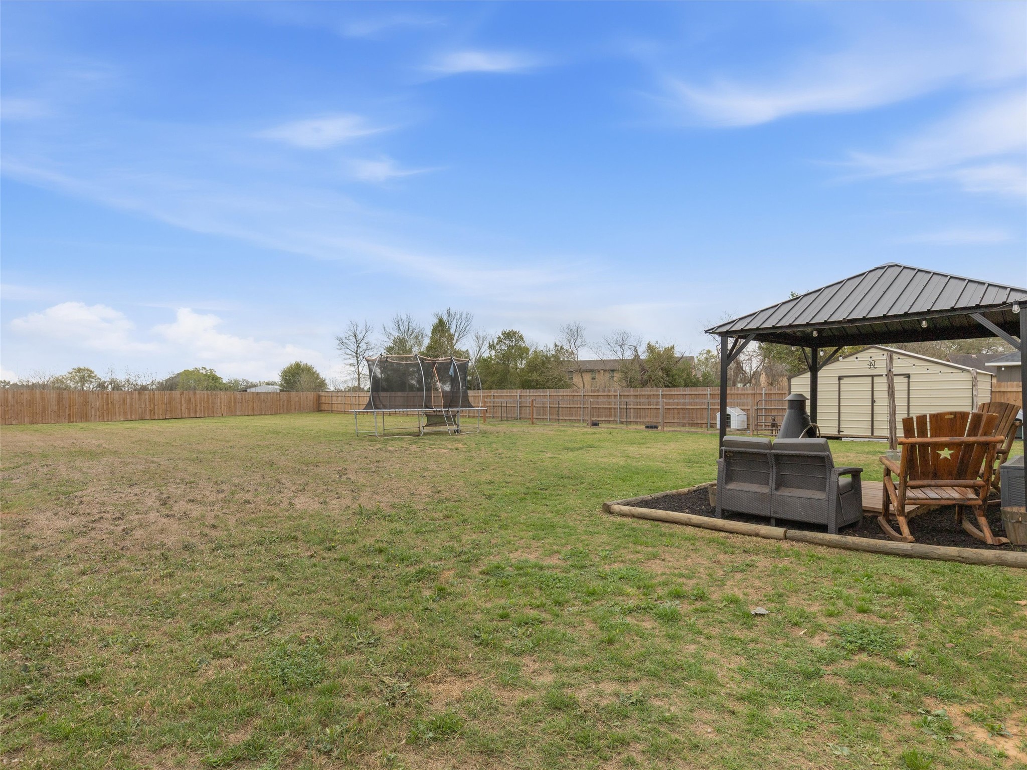 334 Webb Street Smithville, TX 78957 - Photo 29 of 36 a front view of a house with garden