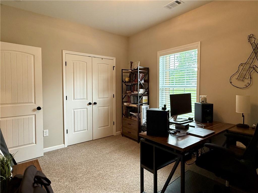 1776 Pleasant Grove Road Temple, GA 30179 - Photo 24 of 45 a view of a workspace with furniture