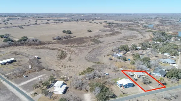 a view of swimming pool with an outdoor space and seating area
