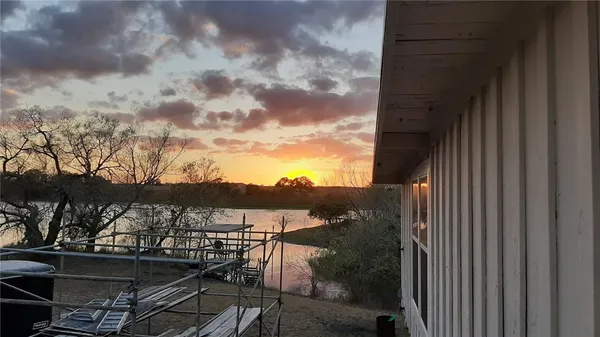 an aerial view of beach and residential space
