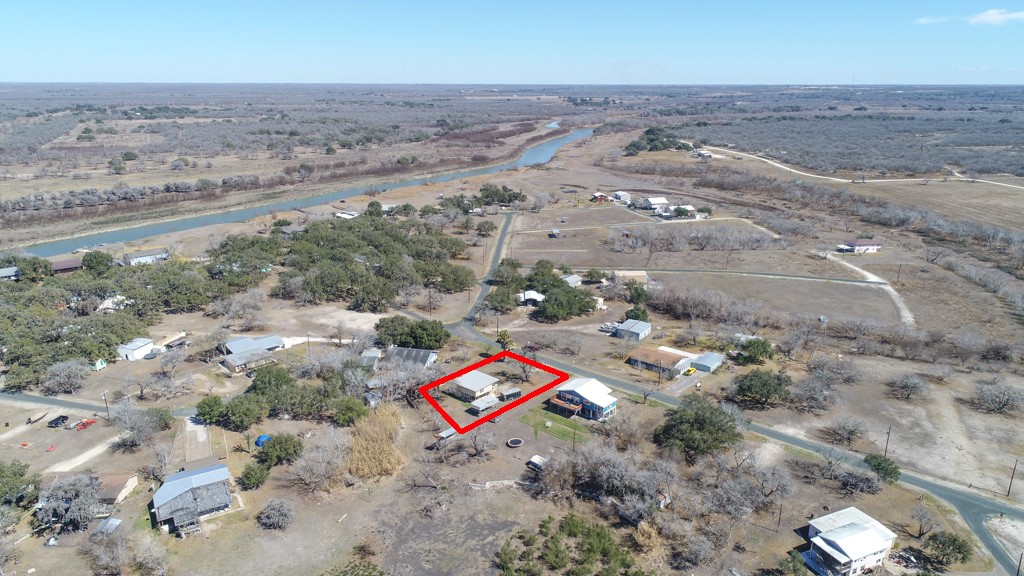 167 Buckeye Knoll Road George West, TX 78022 - Photo 5 of 40 an aerial view of beach and residential space