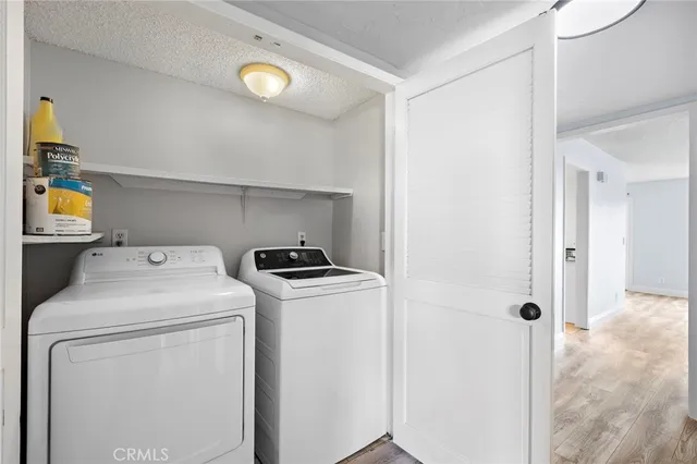 a view of an house with backyard space and balcony