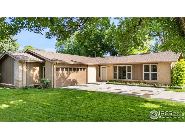 a house view with a garden space