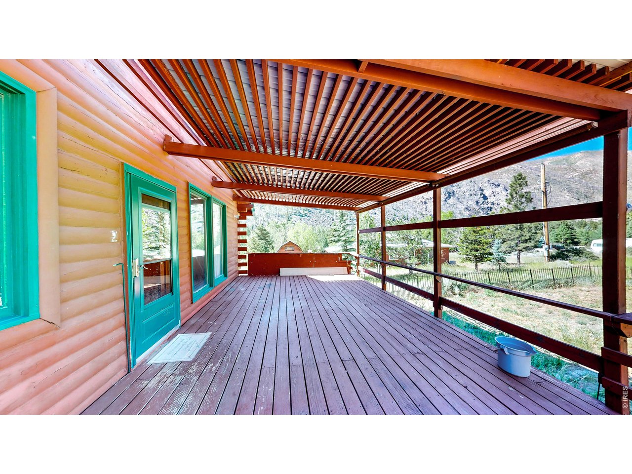 32759 Poudre Canyon Road Bellvue, CO 80512 - Photo 19 of 25 coffee on the large deck