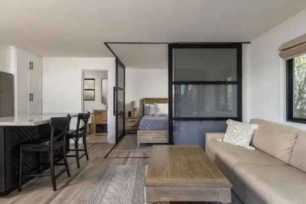 a view of a dining room with furniture window and outside view