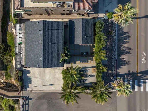 a picture of a bench in front of a wall