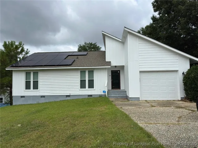 a front view of house with yard