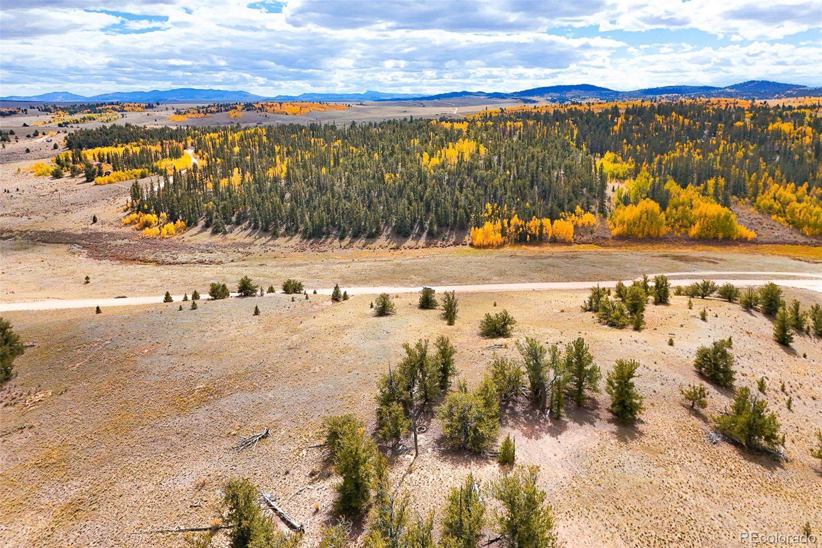 3370 Remington Road Jefferson, CO 80456 - Photo 16 of 41 a view of a lake with boats and trees