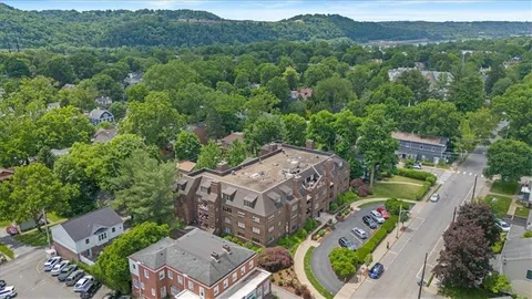 an aerial view of residential house with outdoor space