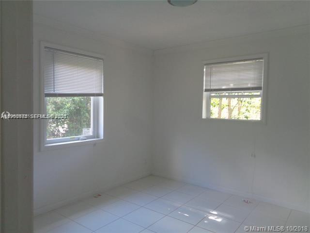 1925 Thomas Street, Unit 1925 Hollywood, FL 33020 - Photo 11 of 24 a view of an empty room with a window
