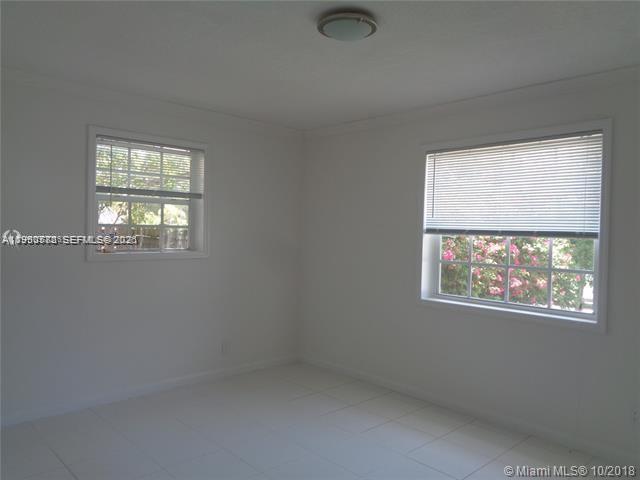 1925 Thomas Street, Unit 1925 Hollywood, FL 33020 - Photo 17 of 24 a view of an empty room with a window
