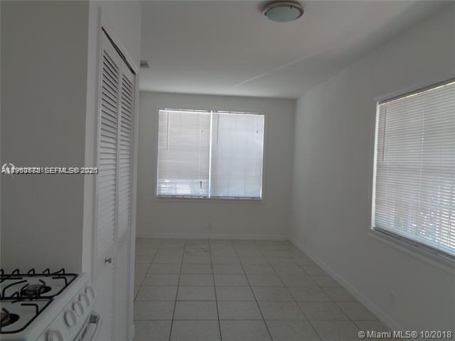 1925 Thomas Street, Unit 1925 Hollywood, FL 33020 - Photo 8 of 24 an empty room with windows