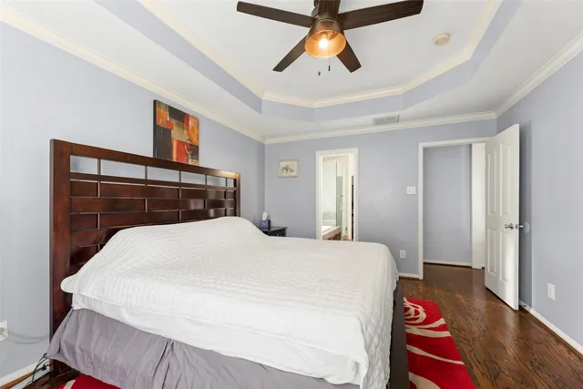 a bathroom with a granite countertop tub sink and mirror