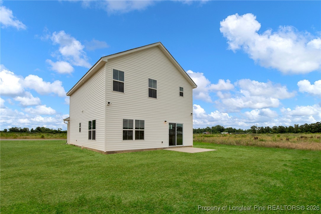 253 Barberry Road Raeford, NC 28376 - Photo 25 of 31 a view of a house with a yard