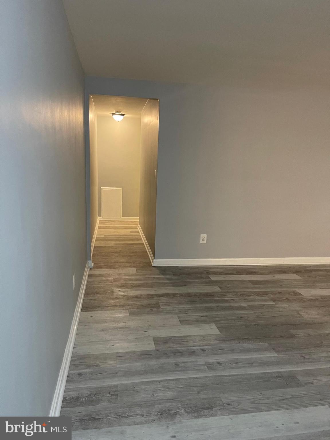 95 East Wayne Avenue, Unit 204 Silver Spring, MD 20901 - Photo 11 of 16 hall way to the master bedroom