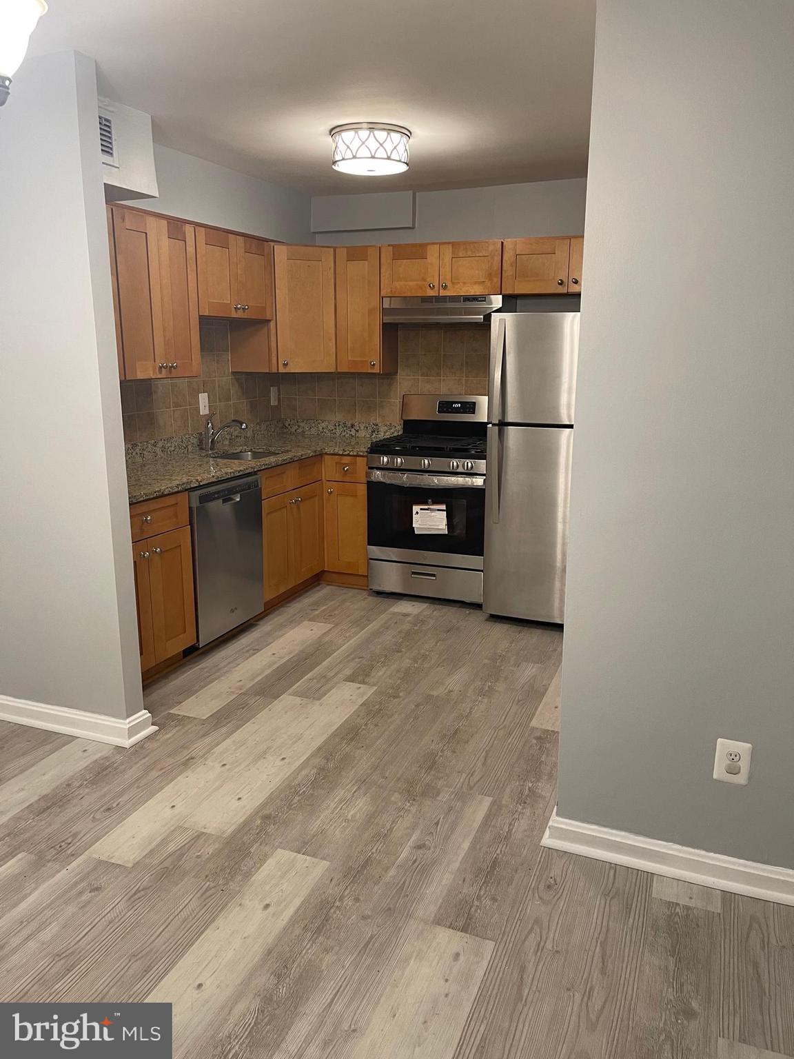 95 East Wayne Avenue, Unit 204 Silver Spring, MD 20901 - Photo 9 of 16 Beautiful kitchen newer cabinets and ss appliances