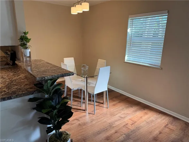 a view of a workspace with furniture