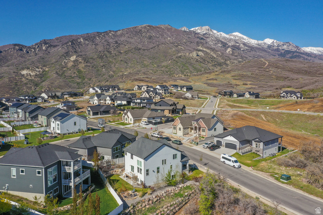 14728 South Canyon Pointe Road Draper, UT 84020 - Photo 35 of 35 New construction community featuring diverse architectural styles, paved roadways, and mountain backdrops