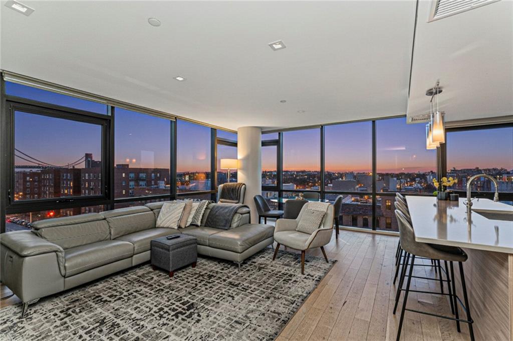 401 95th Street, Unit 6A Brooklyn, NY 11209 - Photo 9 of 24 a living room with furniture and a large window