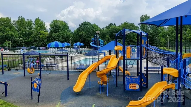 a view of a park with a slide