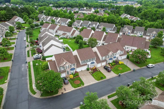 an aerial view of residential house with outdoor space