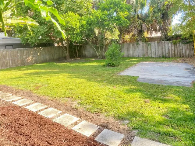 a view of a yard with a trees