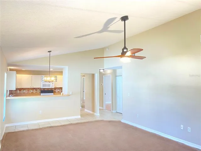a view of a room with a chandelier