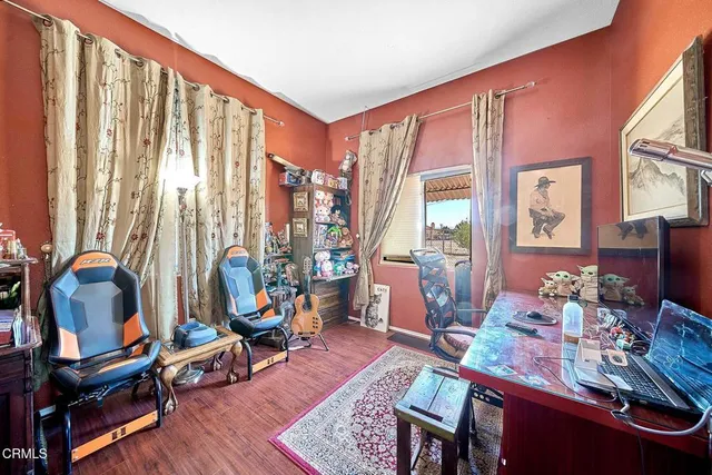 a room with furniture and a window