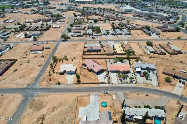 an aerial view of a room with lots of residential buildings