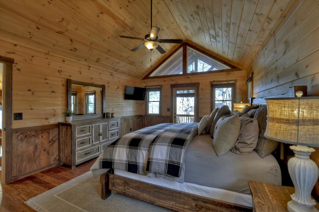 136 Oasis Drive Blue Ridge, GA 30513 - Photo 29 of 47 a front view of a house with balcony