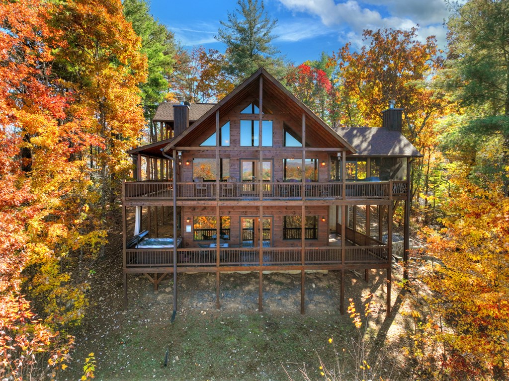 136 Oasis Drive Blue Ridge, GA 30513 - Photo 5 of 47 front view of a house with a small yard