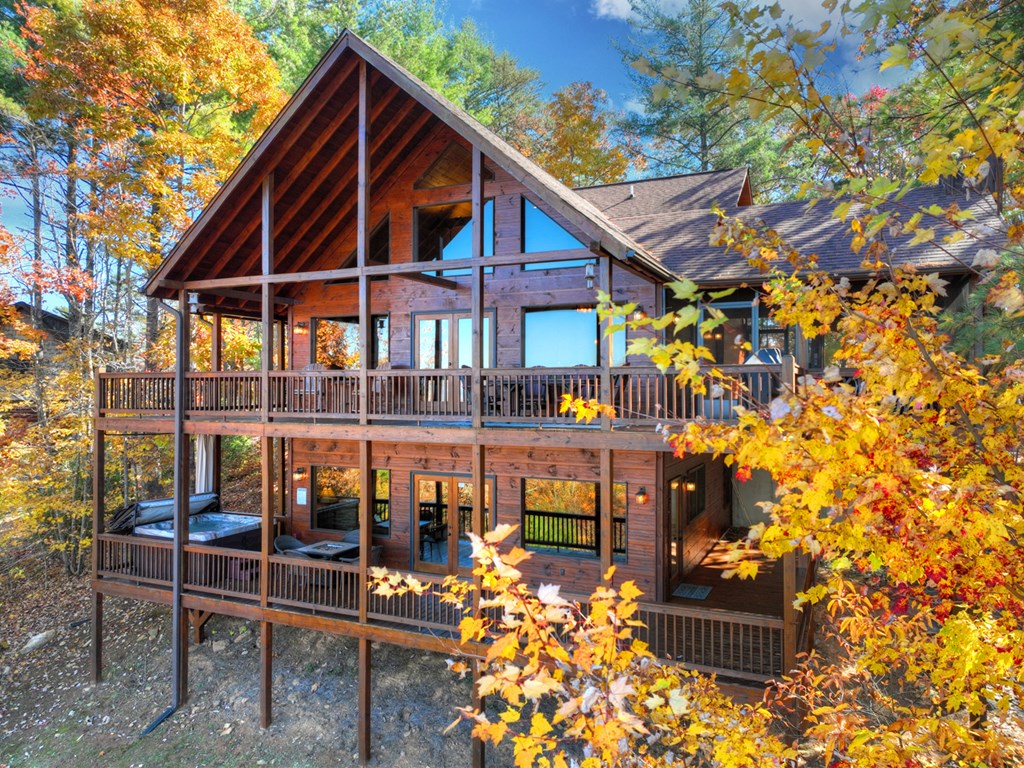 136 Oasis Drive Blue Ridge, GA 30513 - Photo 7 of 47 a front view of a house with balcony