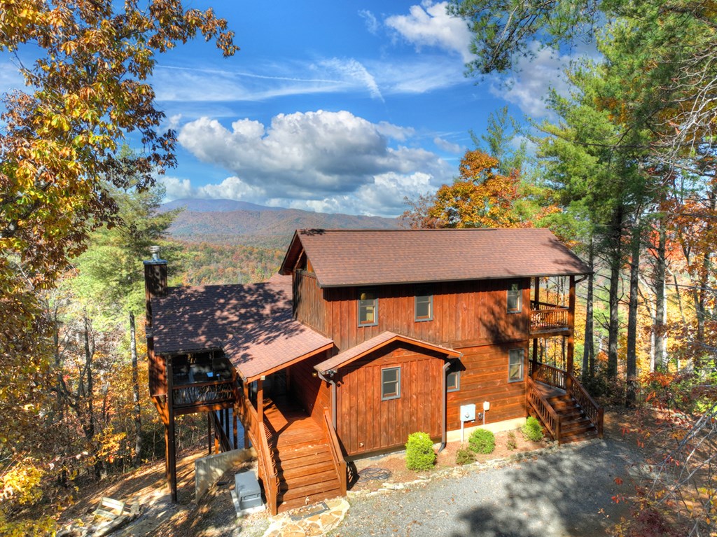 136 Oasis Drive Blue Ridge, GA 30513 - Photo 10 of 47 a street sign on a beach