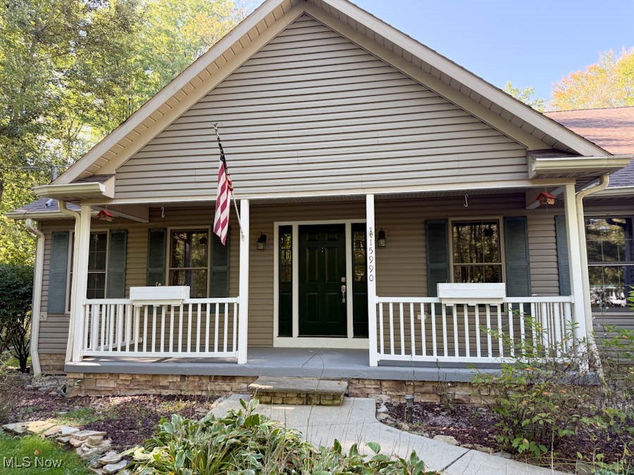 15990 Old State Road Middlefield, OH 44062 - Photo 2 of 24 View of front of home with covered porch